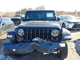 2021 Jeep Wrangler 80th Anniversary with VIN 1C4GJXAN0MW557797, listed as a IAAI auction lot 41505457 with 40,611 mi miles and . Bid and sale history available at DreamBid. Image 12.