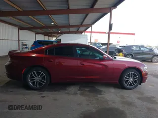 2019 Dodge Charger SXT with VIN 2C3CDXJG0KH757909, listed as a IAAI auction lot 41597907 with 71,882 mi miles and . Bid and sale history available at DreamBid. Image 13.