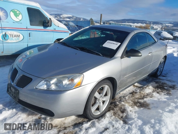 2006 Pontiac G6 GT with VIN 1G2ZH358864245408, listed as a IAAI auction lot 41609030 with 153,168 mi miles and . Bid and sale history available at DreamBid. Image 2.