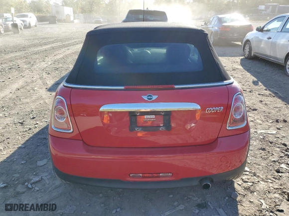 2014 MINI Cooper Convertible with VIN WMWZN3C5XET861142, listed as a Copart auction lot 75665764 with 71,208 mi miles and Salvage Title. Bid and sale history available at carsss.com. Image 6.