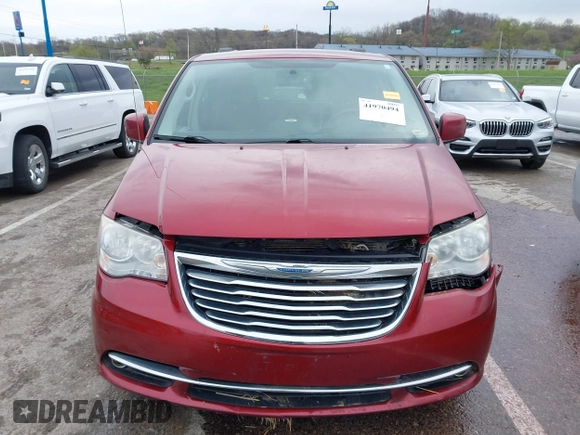 2012 Chrysler Town & Country Touring with VIN 2C4RC1BG8CR344068, listed as a IAAI auction lot 41970494 with 130,559 mi miles. Bid and sale history available at carsss.com. Image 12.