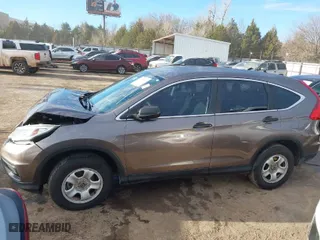 2015 Honda CR-V LX with VIN 3CZRM3H34FG707841, listed as a IAAI auction lot 41654996 with 133,894 mi miles. Bid and sale history available at carsss.com. Image 14.