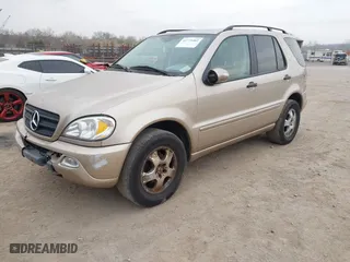 2002 Mercedes-Benz M-Class with VIN 4JGAB54E82A308902, listed as a IAAI auction lot 41779482 with 99,933 mi miles. Bid and sale history available at carsss.com. Image 2.