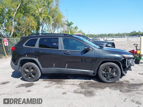 2016 Jeep Cherokee Latitude with VIN 1C4PJLCB6GW184264, listed as a IAAI auction lot 41783299 with 187,767 mi miles. Bid and sale history available at carsss.com. Image 13.
