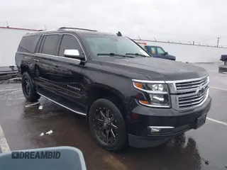 2017 Chevrolet Suburban Premier with VIN 1GNSKJKC4HR162261, listed as a IAAI auction lot 41593672 with 100,136 mi miles and . Bid and sale history available at DreamBid. Image 1.