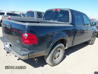 2003 Ford F-150 XLT with VIN 1FTRW07L83KC62296, listed as a IAAI auction lot 41689891 with 272,210 mi miles. Bid and sale history available at carsss.com. Image 4.