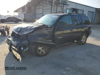 2003 GMC Envoy SLE with VIN 1GKDS13S232329083, listed as a Copart auction lot 73147534 with 212,645 mi miles and Salvage Title. Bid and sale history available at DreamBid. Image 1.