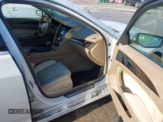 2015 Cadillac CTS Luxury AWD z VIN 1G6AX5SX9F0107244, wystawiony jako IAAI lot #42386444 z przebiegiem 171 413 mil mil oraz . Historia ofert i sprzedaży dostępna na DreamBid. Obrazek 5.