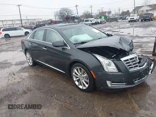 2013 Cadillac XTS Luxury with VIN 2G61R5S35D9100771, listed as a IAAI auction lot 41673766 with 41,123 mi miles. Bid and sale history available at carsss.com. Image 1.