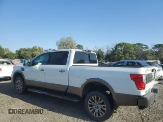 2017 Nissan Titan XD PRO-4X with VIN 1N6BA1F44HN541022, listed as a Copart auction lot 73966134 with 66,582 mi miles and Salvage Title. Bid and sale history available at carsss.com. Image 2.