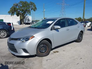 2014 Toyota Corolla L with VIN 2T1BURHE5EC006925, listed as a IAAI auction lot 40917569 with 130,761 mi miles and . Bid and sale history available at DreamBid. Image 17.