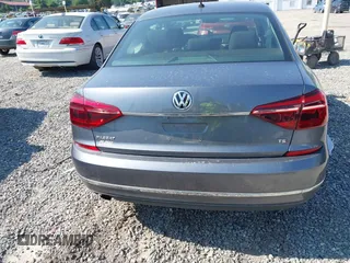 2017 Volkswagen Passat S with VIN 1VWAT7A35HC076253, listed as a IAAI auction lot 42594657 with 121,103 mi miles and . Bid and sale history available at DreamBid. Image 16.