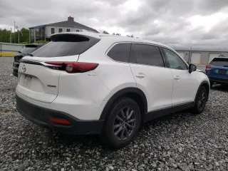 2022 Mazda CX-9 Touring with VIN JM3TCBCYXN0619317, listed as a Copart auction lot 58264755 with 139,478 mi miles and Salvage title. Bid and sale history available at DreamBid. Image 3.