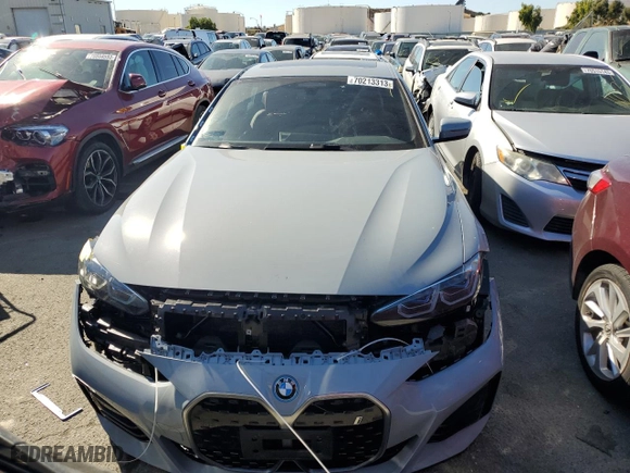 2022 BMW i4 eDrive40 with VIN WBY73AW0XNFN24679, listed as a Copart auction lot 70213313 with 14,403 mi miles. Bid and sale history available at carsss.com. Image 5.