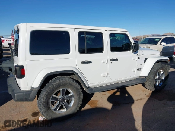 2019 Jeep Wrangler Unlimited Sahara с VIN 1C4HJXEN9KW509839, выставлен на аукционе IAAI как лот 41054085 с пробегом 78 850 миль миль и . История ставок и продаж доступна на DreamBid. Изображение 13.