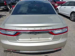 2017 Lincoln Continental Select z VIN 1LN6L9SK0H5631653, wystawiony jako IAAI lot #42092357 z przebiegiem Nie podano mil oraz . Historia ofert i sprzedaży dostępna na DreamBid. Obrazek 16.