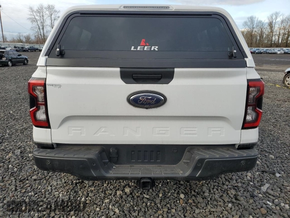 2024 Ford Ranger XLT with VIN 1FTER4HH5RLE15159, listed as a Copart auction lot 46310435 with 1,858 mi miles and Salvage Title. Bid and sale history available at carsss.com. Image 6.