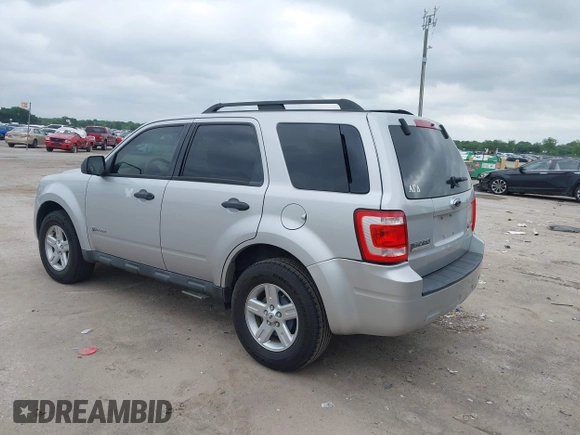 2009 Ford Escape Hybrid with VIN 1FMCU49389KD10786, listed as a IAAI auction lot 42134866 with 112,696 mi miles and . Bid and sale history available at DreamBid. Image 3.