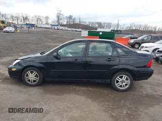 2000 Ford Focus SE with VIN 1FAFP34P7YW189078, listed as a IAAI auction lot 41222051 with 100,067 mi miles and . Bid and sale history available at carsss.com. Image 14.