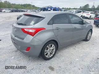2013 Hyundai Elantra GT with VIN KMHD35LE8DU033254, listed as a IAAI auction lot 41956469 with 98,484 mi miles. Bid and sale history available at carsss.com. Image 4.