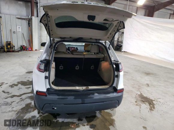 2019 Jeep Cherokee Latitude with VIN 1C4PJMCB5KD158331, listed as a Copart auction lot 86852044 with 86,495 mi miles and Salvage Title. Bid and sale history available at carsss.com. Image 6.