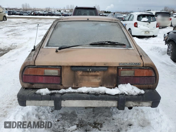 1979 Datsun 280ZX z VIN HS130137808, wystawiony jako Copart lot #43799165 z przebiegiem 28 995 mil mil oraz Tytuł czysty. Historia ofert i sprzedaży dostępna na DreamBid. Obrazek 6.