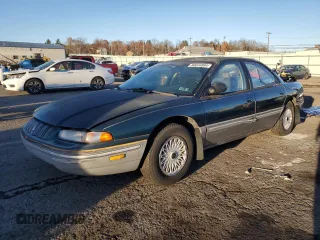 1993 Chrysler Concorde z VIN 2C3EL56T9PH636017, wystawiony jako Copart lot #80644804 z przebiegiem 124 677 mil mil oraz Szkody całkowita. Historia ofert i sprzedaży dostępna na DreamBid. Obrazek 1.