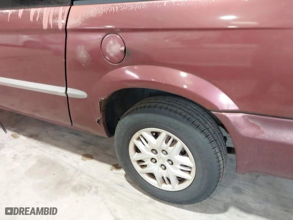 2001 Dodge Caravan Sport with VIN 2B4GP44351R247119, listed as a IAAI auction lot 41824983 with 157,156 mi miles. Bid and sale history available at carsss.com. Image 13.