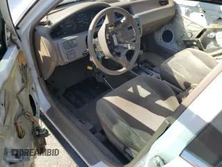 1995 Honda Civic LX z VIN JHMEG8656SS016258, wystawiony jako Copart lot #72629664 z przebiegiem 64 865 mil mil oraz Szkody całkowita. Historia ofert i sprzedaży dostępna na DreamBid. Obrazek 8.