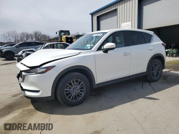 2021 Mazda CX-5 Touring z VIN JM3KFBCM9M1386068, wystawiony jako Copart lot #51735225 z przebiegiem 68 728 mil mil oraz Szkoda całkowita • Salvage title. Historia ofert i sprzedaży dostępna na DreamBid. Obrazek 1.