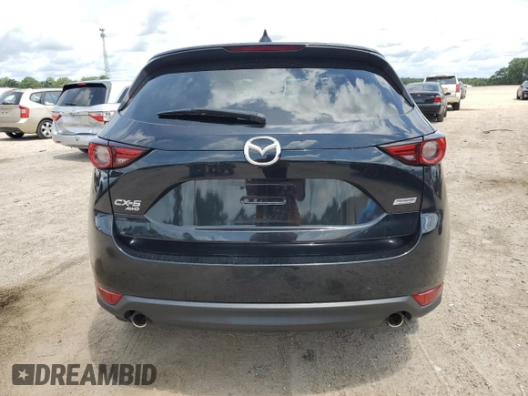 2018 Mazda CX-5 Grand Touring с VIN JM3KFBDM0J0362967, выставлен на аукционе Copart как лот 60288665 с пробегом 137 241 миль миль и Списание • Salvage title. История ставок и продаж доступна на DreamBid. Изображение 6.