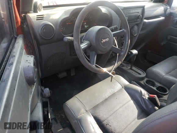 2009 Jeep Wrangler X with VIN 1J4FA24119L756089, listed as a Copart auction lot 56953205 with 158,157 mi miles and Salvage title. Bid and sale history available at DreamBid. Image 8.