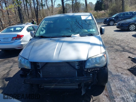 2017 Dodge Grand Caravan SE with VIN 2C4RDGBG9HR732854, listed as a IAAI auction lot 41980430 with 124,726 mi miles and . Bid and sale history available at DreamBid. Image 12.