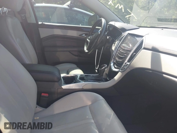 2013 Cadillac SRX Luxury Collection z VIN 3GYFNCE36DS602877, wystawiony jako IAAI lot #42305742 z przebiegiem 257 603 mil mil oraz . Historia ofert i sprzedaży dostępna na DreamBid. Obrazek 5.