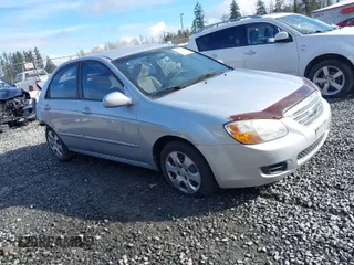 2007 Kia Spectra EX with VIN KNAFE121375453966, listed as a IAAI auction lot 41775758 with 211,586 mi miles. Bid and sale history available at carsss.com. Image 1.