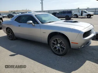 2016 Dodge Challenger R/T Plus with VIN 2C3CDZBT8GH101892, listed as a Copart auction lot 62171595 with 195,533 mi miles and Salvage title. Bid and sale history available at DreamBid. Image 4.