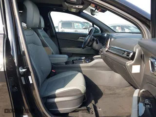 2023 Kia Sportage Plug-In Hybrid X-Line with VIN KNDPYDAH9P7027170, listed as a IAAI auction lot 41583963 with 15,276 mi miles. Bid and sale history available at carsss.com. Image 5.