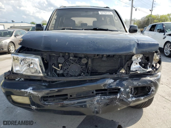 1999 Toyota Land Cruiser with VIN JT3HT05J8X0060988, listed as a Copart auction lot 52764175 with 217,199 mi miles and Salvage Title. Bid and sale history available at carsss.com. Image 5.