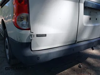 2016 Nissan NV200 S with VIN 3N6CM0KN1GK697513, listed as a IAAI auction lot 42072794 with 296,501 mi miles. Bid and sale history available at carsss.com. Image 18.