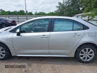 2023 Toyota Corolla LE with VIN 5YFB4MDE7PP015928, listed as a IAAI auction lot 42115319 with 60,434 mi miles. Bid and sale history available at carsss.com. Image 14.