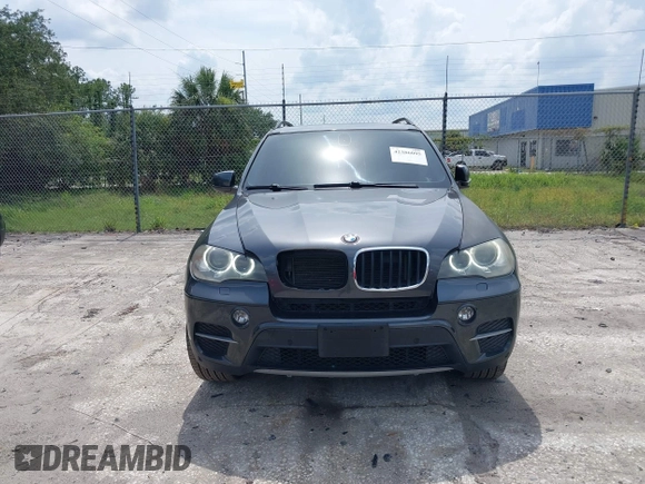 2012 BMW X5 35i z VIN 5UXZV4C5XCL990728, wystawiony jako IAAI lot #42386095 z przebiegiem 124 613 mil mil oraz . Historia ofert i sprzedaży dostępna na DreamBid. Obrazek 12.
