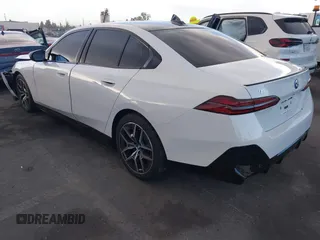 2024 BMW i5 M60 with VIN WBY43FK05RCR89416, listed as a IAAI auction lot 41263506 with 5,062 mi miles and . Bid and sale history available at DreamBid. Image 3.