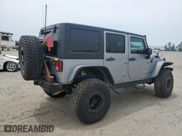 2013 Jeep Wrangler Unlimited Rubicon with VIN 1C4BJWFG5DL661282, listed as a Copart auction lot 57471035 with 128,400 mi miles and Salvage title. Bid and sale history available at DreamBid. Image 3.