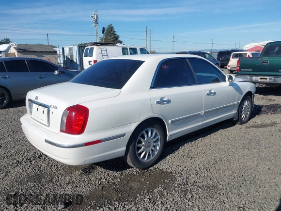 2005 Hyundai XG z VIN KMHFU45E85A386500, wystawiony jako IAAI lot #41658161 z przebiegiem 181 578 mil mil oraz . Historia ofert i sprzedaży dostępna na DreamBid. Obrazek 4.