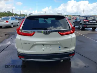 2018 Honda CR-V Touring with VIN 2HKRW1H96JH506435, listed as a IAAI auction lot 41228873 with 11,585 mi miles and . Bid and sale history available at DreamBid. Image 17.