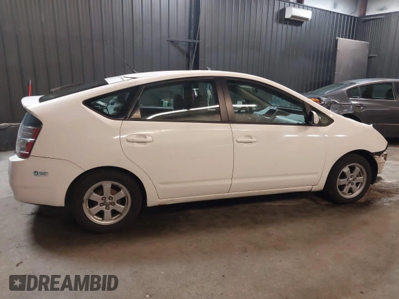 2005 Toyota Prius with VIN JTDKB22U453123675, listed as a IAAI auction lot 42115542 with 87,252 mi miles. Bid and sale history available at carsss.com. Image 14.