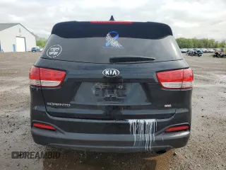 2016 Kia Sorento LX z VIN 5XYPGDA33GG148884, wystawiony jako Copart lot #55864485 z przebiegiem 129 331 mil mil oraz Szkoda całkowita • Salvage title. Historia ofert i sprzedaży dostępna na DreamBid. Obrazek 6.