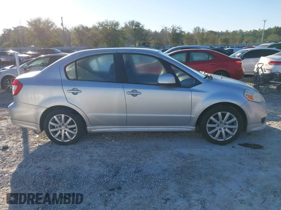 2010 Suzuki SX4 with VIN JS2YC5A46A6310134, listed as a IAAI auction lot 41696108 with 147,059 mi miles and . Bid and sale history available at DreamBid. Image 13.
