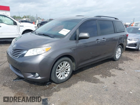 2016 Toyota Sienna XLE with VIN 5TDYK3DC4GS708455, listed as a IAAI auction lot 41914114 with 140,451 mi miles. Bid and sale history available at carsss.com. Image 2.
