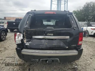 2007 Jeep Grand Cherokee Overland with VIN 1J8HR68227C651830, listed as a Copart auction lot 62403725 with 147,827 mi miles and Salvage title. Bid and sale history available at DreamBid. Image 6.
